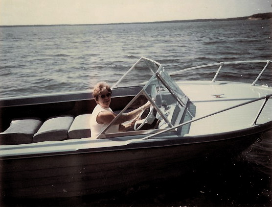 Mildred driving the speed boat