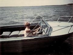 Mildred driving the speed boat