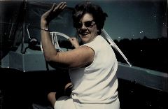 Mildred driving the boat
