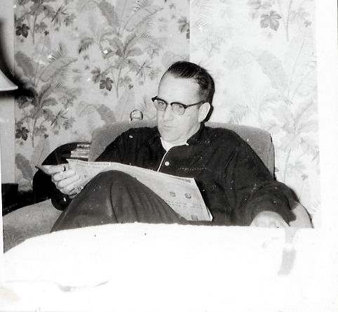 Chuck reading paper