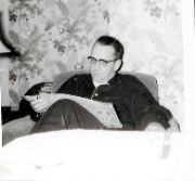 Chuck reading paper