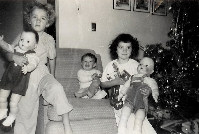 Charlie and Pat and Cathy with dolls