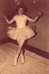 Cathy in ice skating costume, May 1954